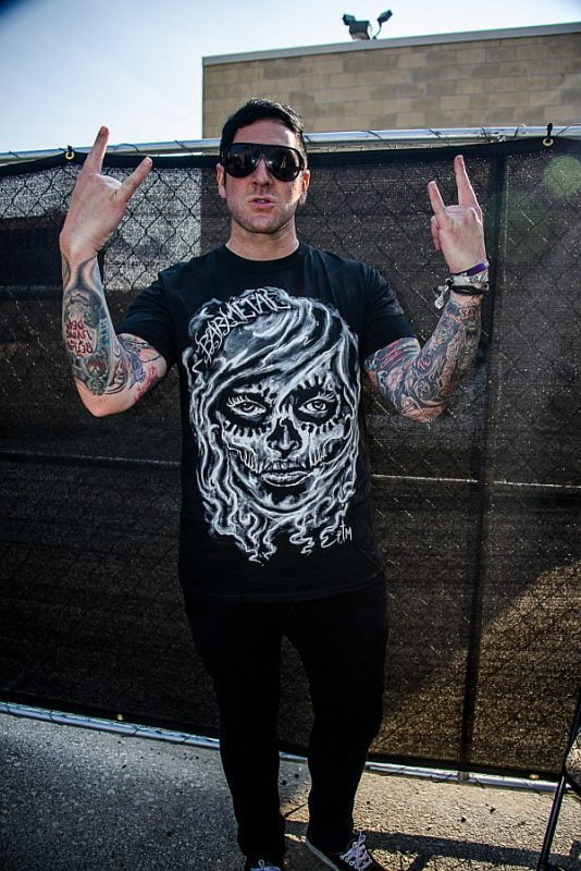 Joe Cotela of Ded wears Smoke Art Tee